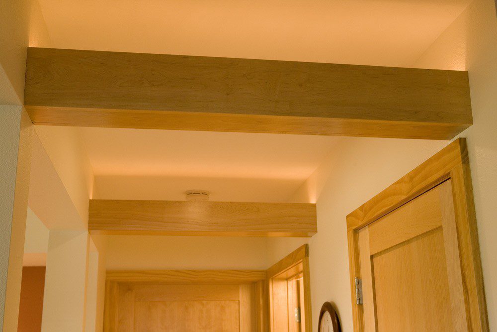 Fuc exposed beam ceiling uplights wood cased doors
